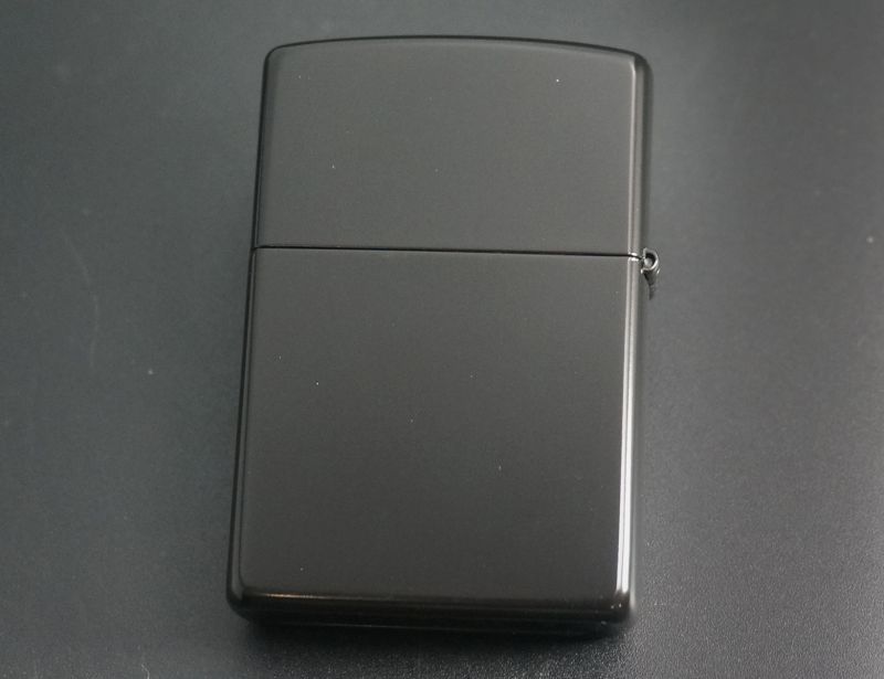 画像: zippo WINDY シルエット オレンジ 黒マット